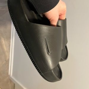 Like new size 9 women Nike slides